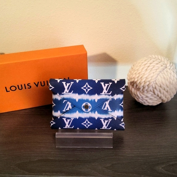 Louis Vuitton Handbags - Like New Louis Vuitton Monogram Escale Medium blue Kirigami Pochette